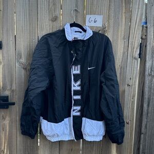 Vintage Nike Black and White Logo Windbreaker Jacket Size large